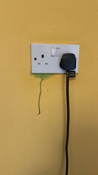 Damaged socket and wall identified during a fault-finding visit